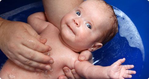 giving a newborn a bath